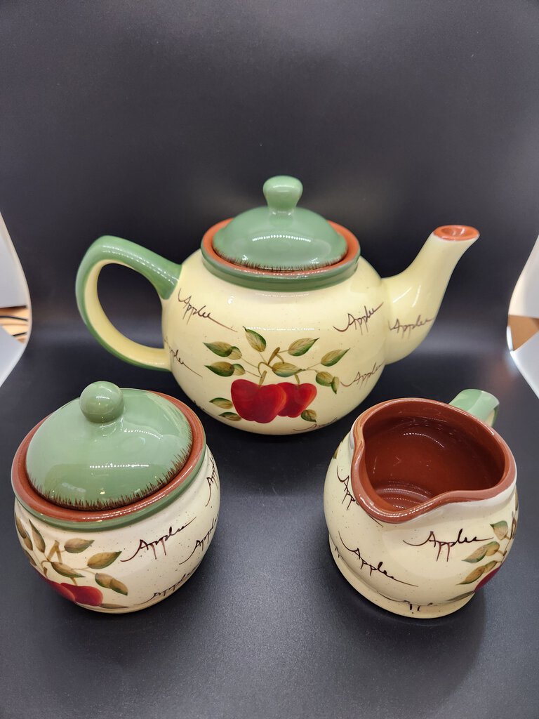 Teapot offers with creamer and sugar